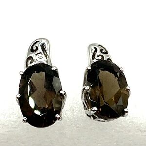 Earrings sterling silver smoky quartz stud earrings oval cut and prong setting.